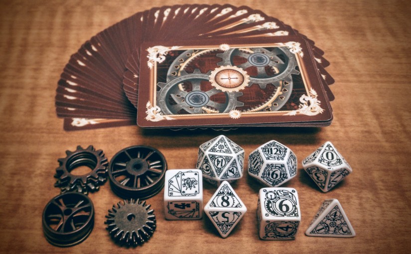 Photo of steampunk Action Deck, bennies, and dice